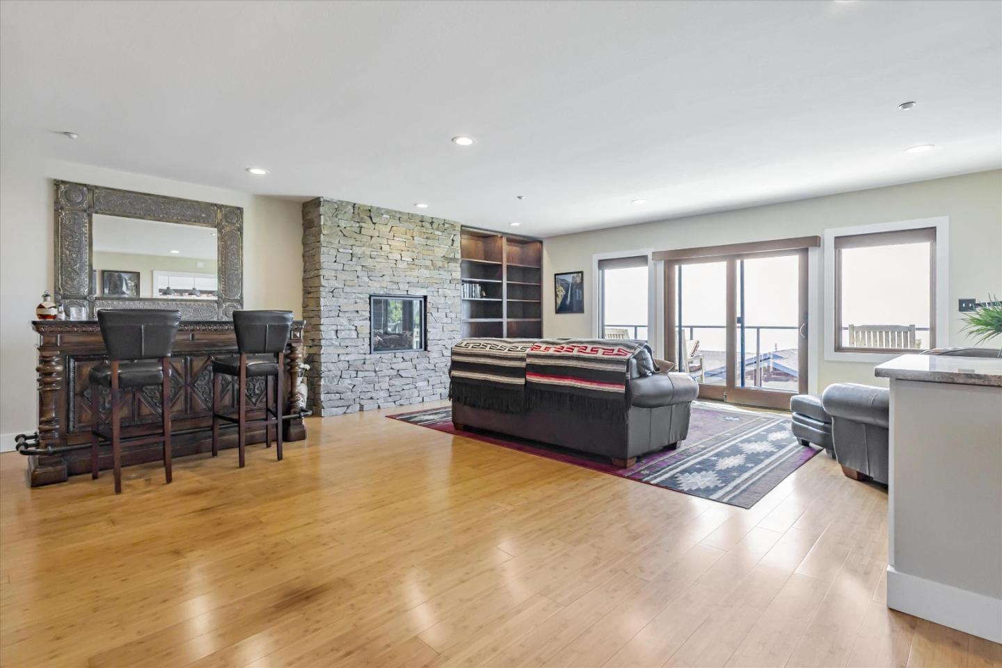 327 Farallon Avenue Pacifica, CA 94044 - Photo 23 of 74 a living room with furniture and a flat screen tv