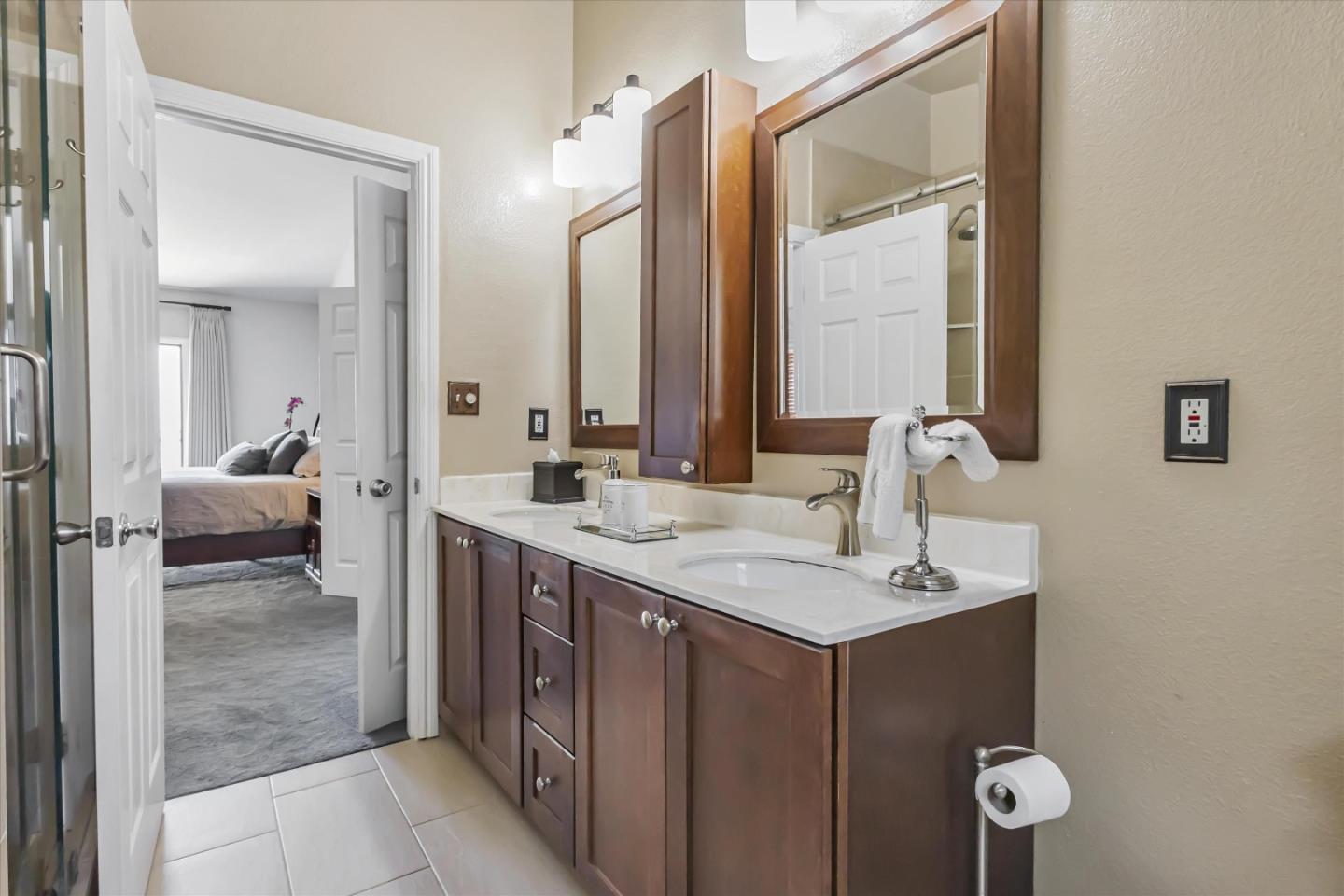 327 Farallon Avenue Pacifica, CA 94044 - Photo 38 of 74 a en suite bathroom with a sink and a mirror