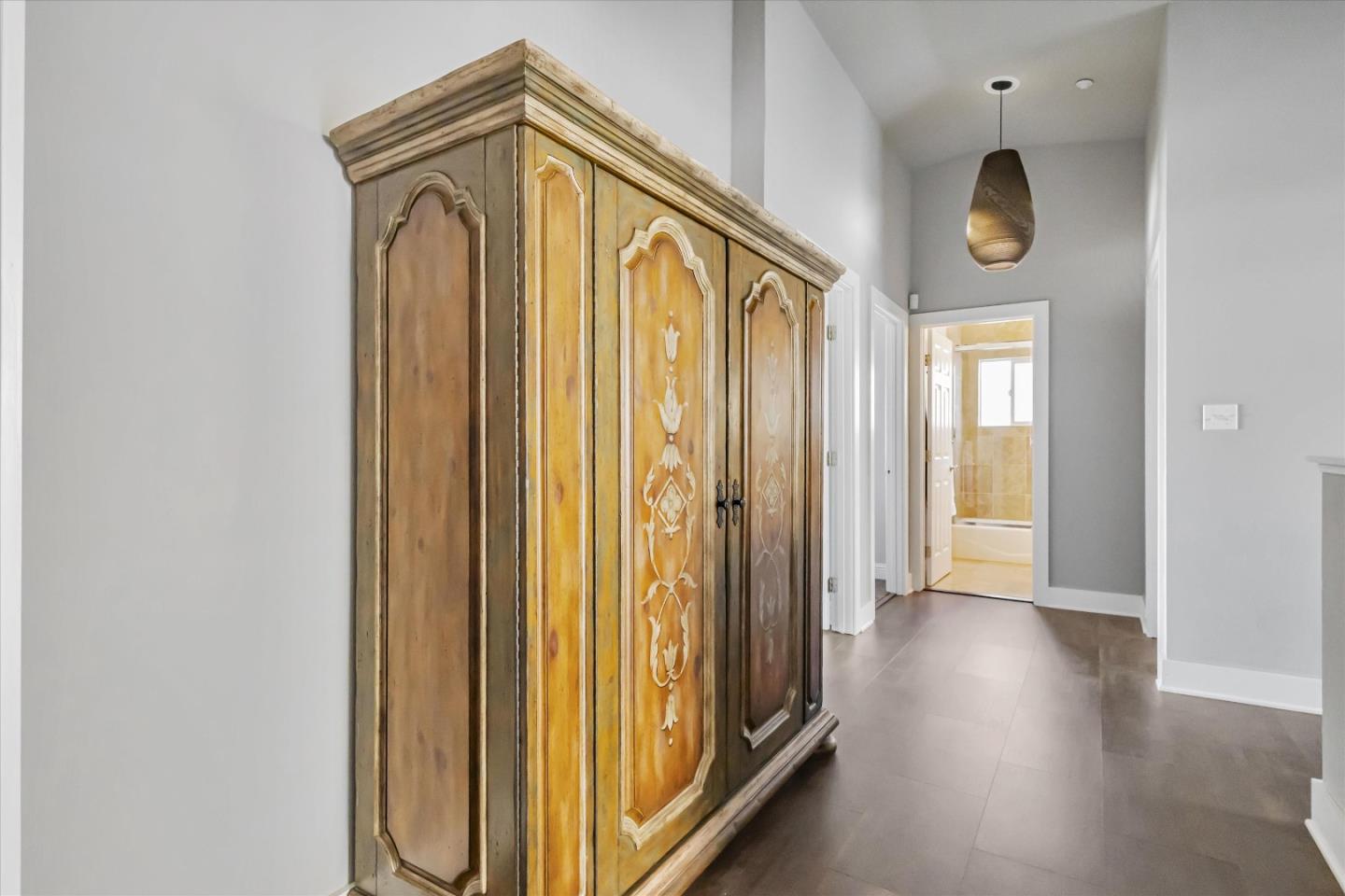 327 Farallon Avenue Pacifica, CA 94044 - Photo 40 of 74 a view of a hallway with wooden floor and windows