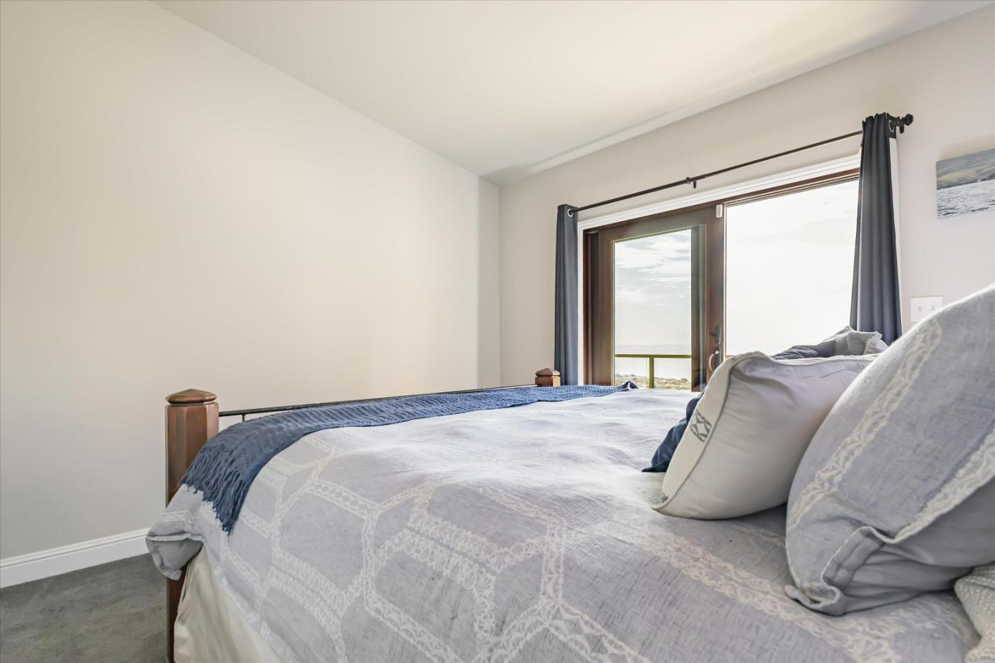 327 Farallon Avenue Pacifica, CA 94044 - Photo 47 of 74 a bed sitting in a bedroom next to a window