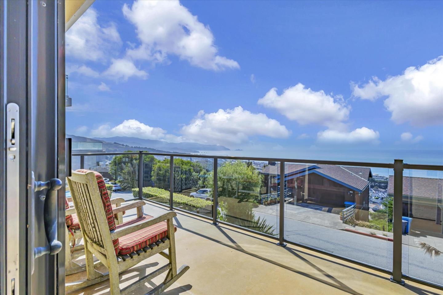 327 Farallon Avenue Pacifica, CA 94044 - Photo 48 of 74 a view of a balcony with floor to ceiling windows yard and balcony