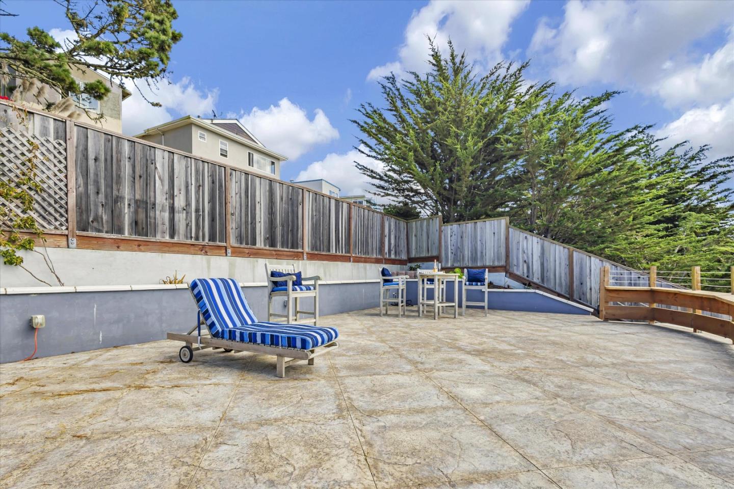 327 Farallon Avenue Pacifica, CA 94044 - Photo 63 of 74 a view of a chairs and tables in the back yard of the house