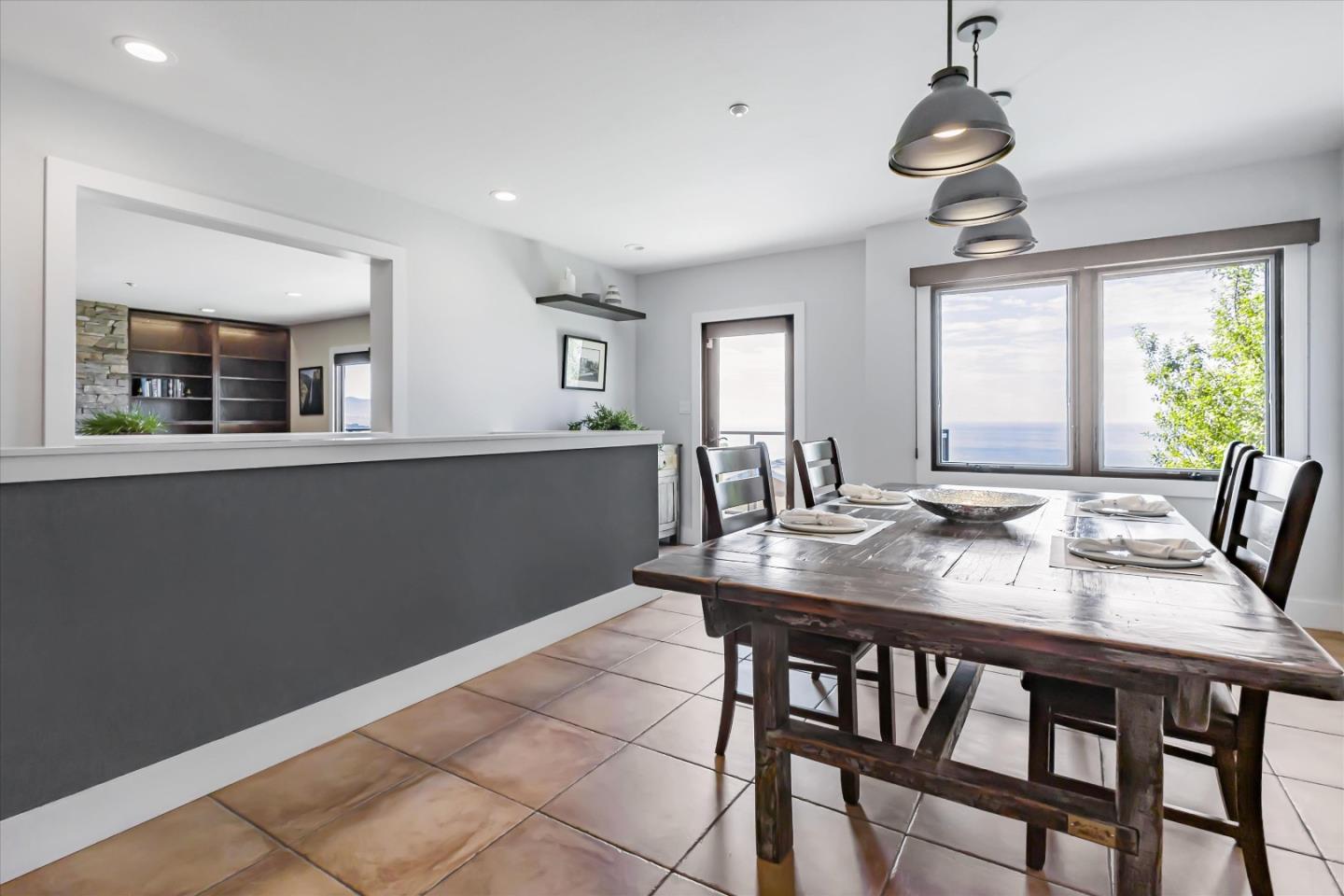 327 Farallon Avenue Pacifica, CA 94044 - Photo 9 of 74 a view of a dining room with furniture window and wooden floor