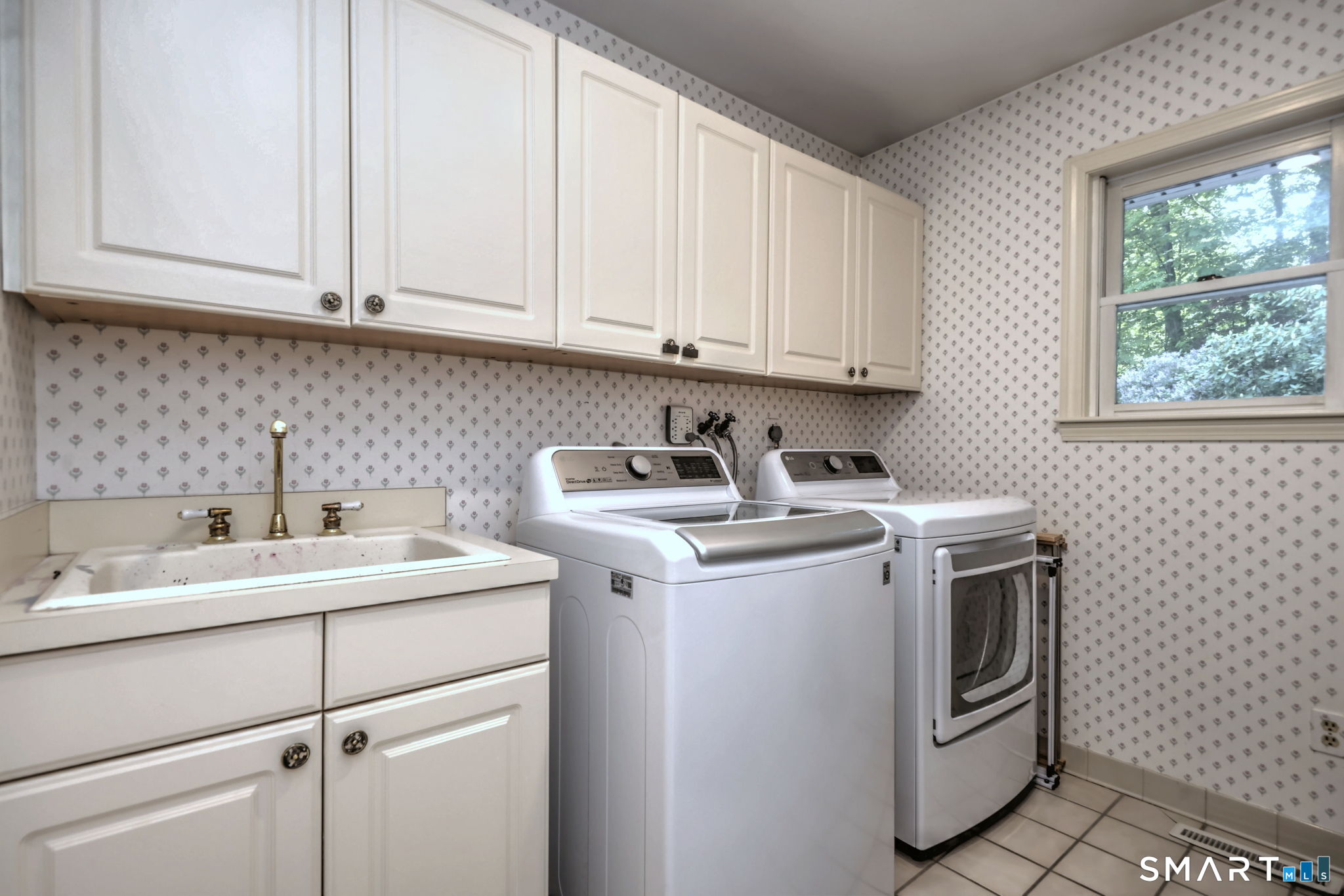 60 West Meadow Road Hamden, CT 06518 - Photo 17 of 35 The laundry room is also off the hallway coming in from the garage. There is also a nice large pantry off that hallway.