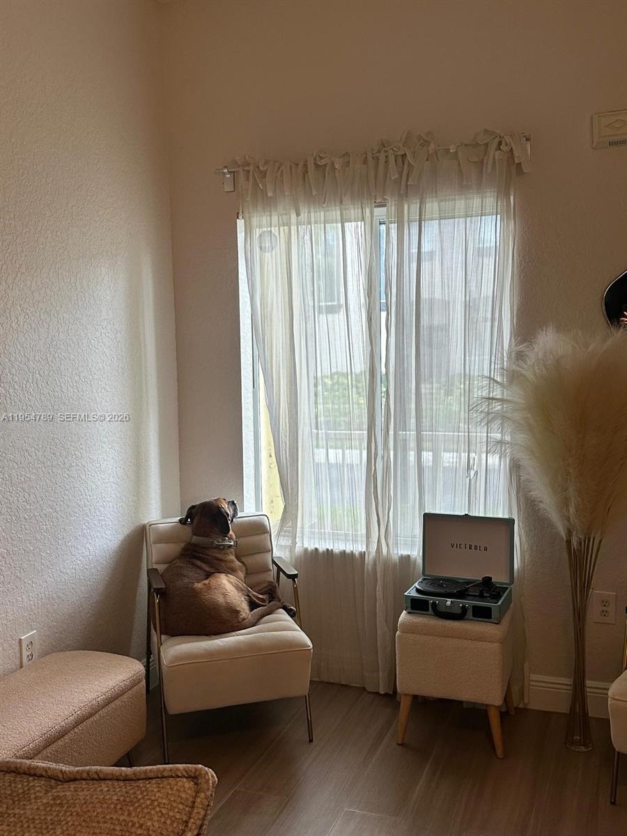 1948 Southeast 24th Avenue Homestead, FL 33035 - Photo 5 of 6 a living room with furniture and a window