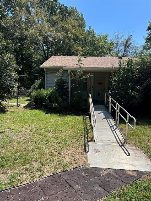4546 Farm To Market 515 Quitman, TX 75783 - Photo 5 of 17 a view of a house with backyard
