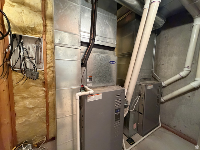 1133 Paris Canyon Road Paris, ID 83261 - Photo 73 of 75 Utility area featuring a forced-air furnace, ductwork, and exposed insulation