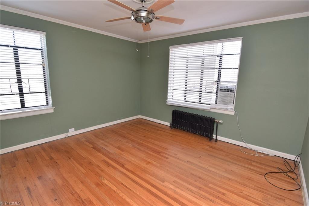 1217 North Main Street, Unit D High Point, NC 27262 - Photo 14 of 30 Master bedroom also has hardwood floors.