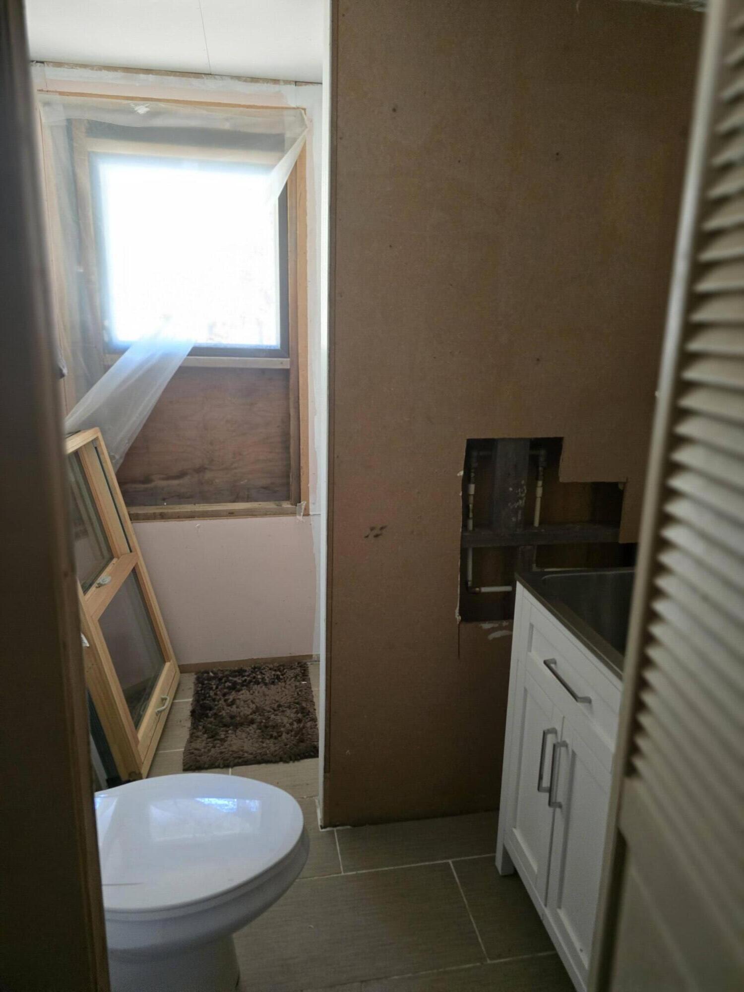 52225 Lechner Lane La Pine, OR 97739 - Photo 14 of 17 bathroom area - shower is located behind the wall area.