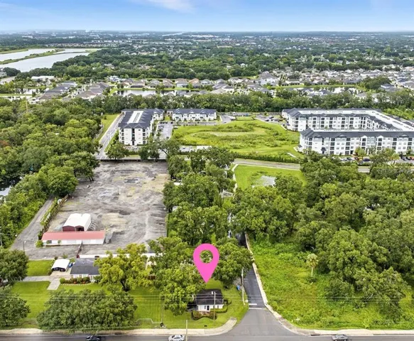 a view of a yard with swimming pool