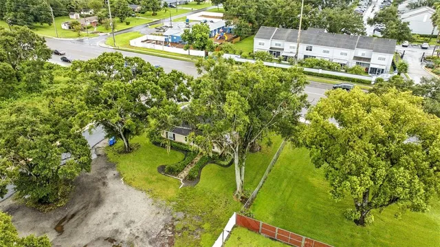 an aerial view of residential building with outdoor space