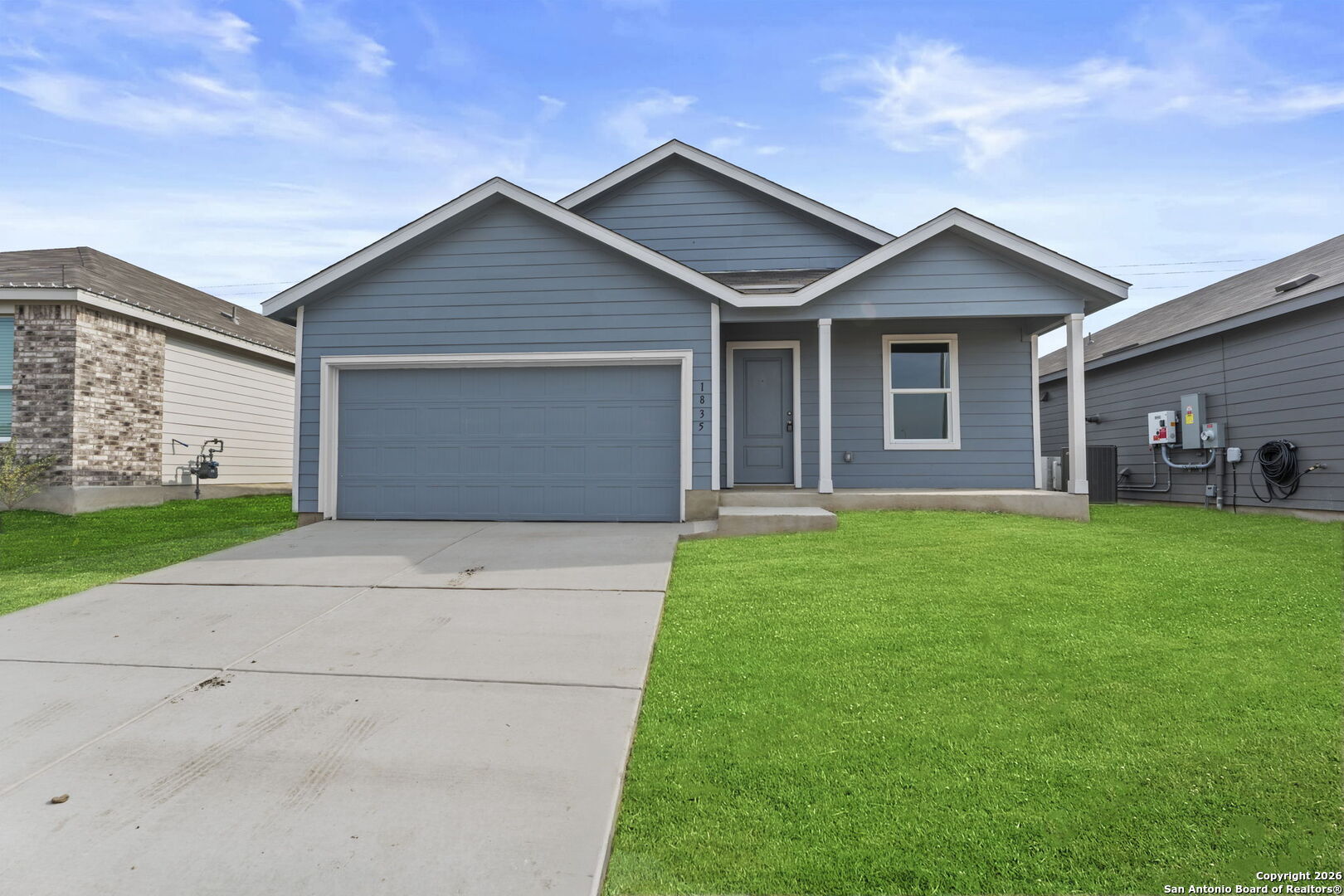 1835 Nuthatch Ridge New Braunfels, TX 78130 - Photo 1 of 23 a front view of house with yard and green space