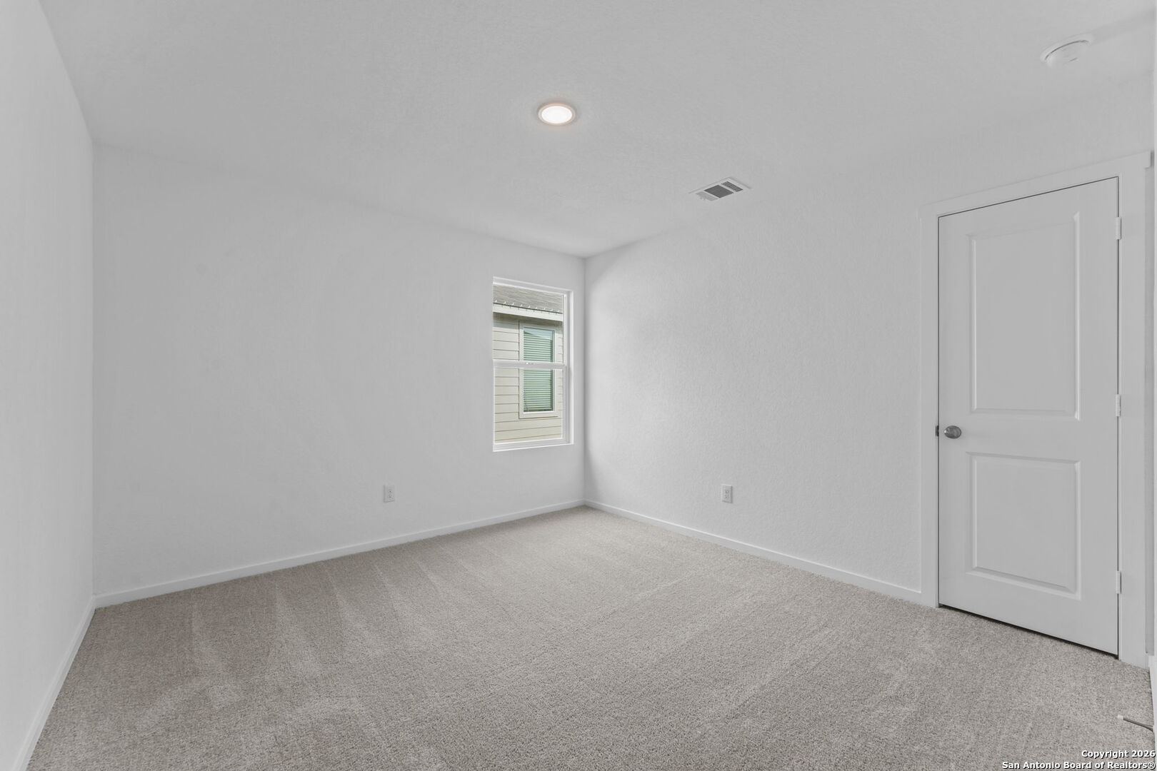 1835 Nuthatch Ridge New Braunfels, TX 78130 - Photo 10 of 23 a view of an empty room with a window