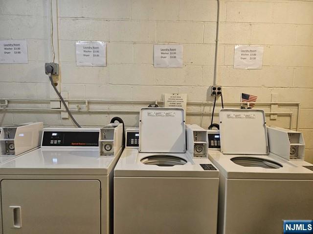 150 County Road, Unit 18 Tenafly, NJ 07670 - Photo 15 of 15 a utility room with dryer and washer