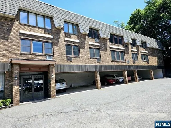 a view of a building with a street