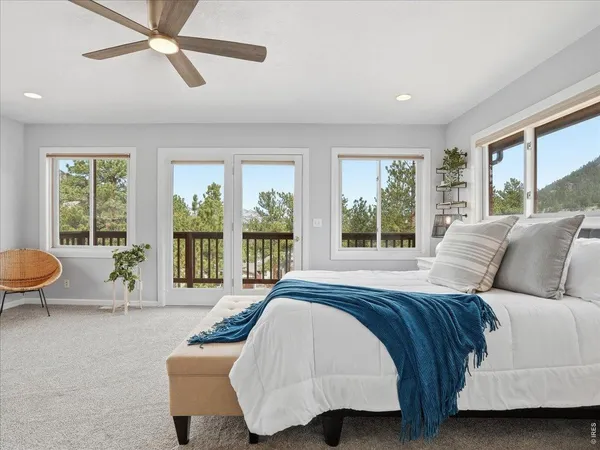 a view of a balcony with chair and table