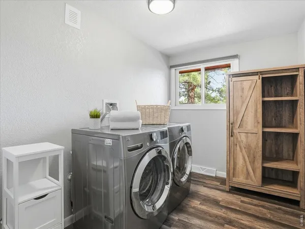 a bathroom with a sink a vanity and a mirror