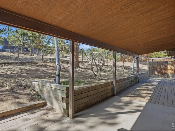 a bathroom with a sink a toilet and shower curtain