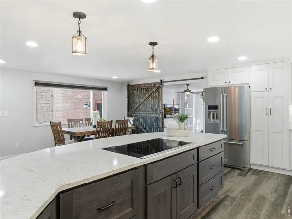a kitchen with a sink and cabinets