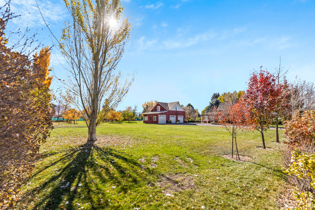 390 North 100 West Monroe, UT 84754 - Photo 27 of 167 View of green lawn with an outbuilding
