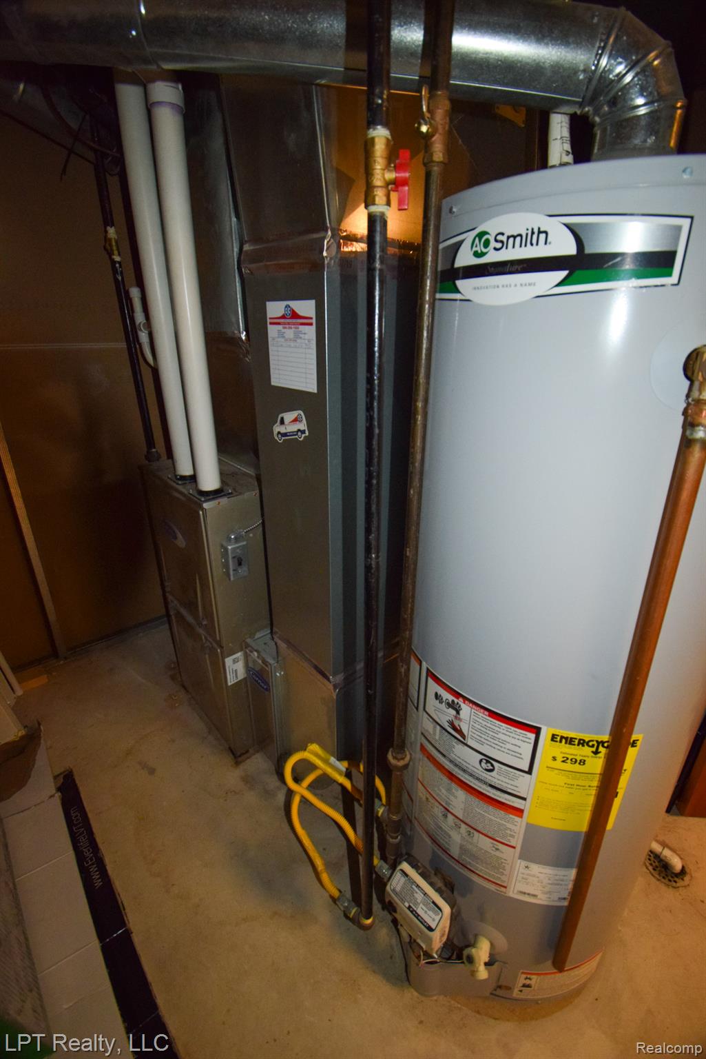 217 Nawakwa Road Rochester, MI 48307 - Photo 29 of 29 Utility room featuring water heater and heating unit