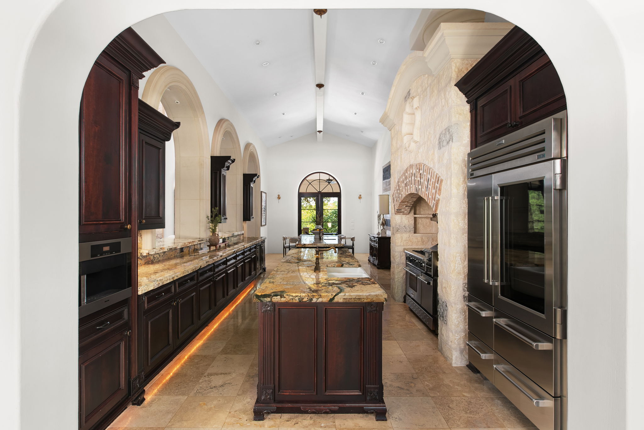 4256 Fischer Store Road Wimberley, TX 78676 - Photo 6 of 40 a living room with granite countertop stainless steel appliances a stove and a refrigerator