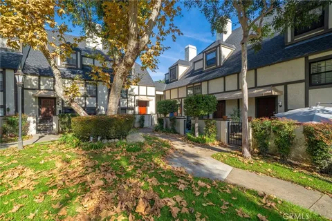 a view of a building with a yard