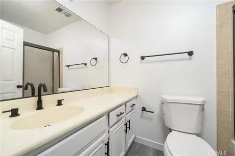 a bathroom with a sink and a toilet