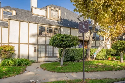 a front view of a building with an outdoor space