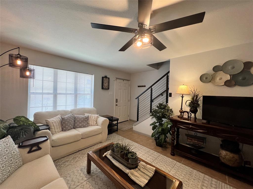 1337 South 11th Street Waco, TX 76706 - Photo 2 of 12 a living room with furniture and a flat screen tv