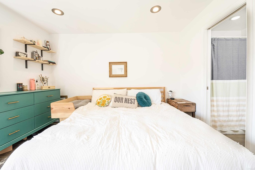 4159 Baycliff Way Oceanside, CA 92056 - Photo 15 of 23 a bedroom with a bed and a window