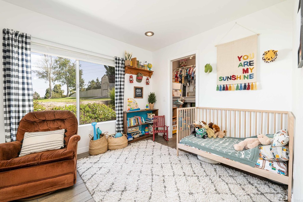 4159 Baycliff Way Oceanside, CA 92056 - Photo 18 of 23 a bed room with furniture and a window