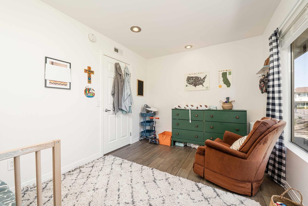 4159 Baycliff Way Oceanside, CA 92056 - Photo 19 of 23 a living room with furniture and a window