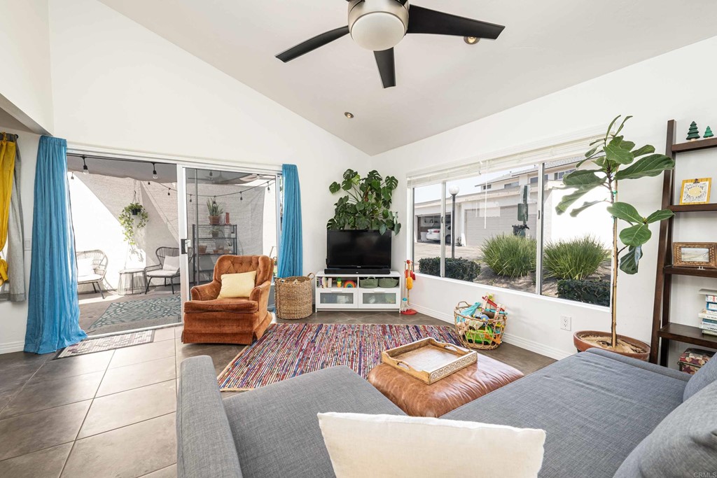 4159 Baycliff Way Oceanside, CA 92056 - Photo 5 of 23 a living room with furniture and a large window