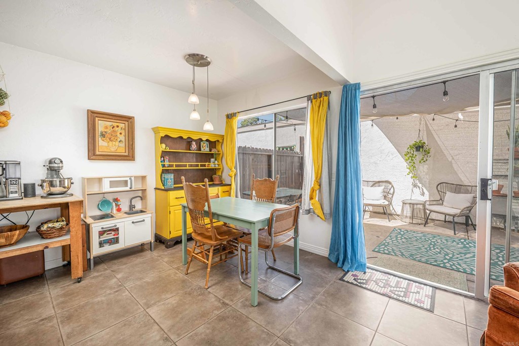 4159 Baycliff Way Oceanside, CA 92056 - Photo 8 of 23 a view of a livingroom with workspace and a window