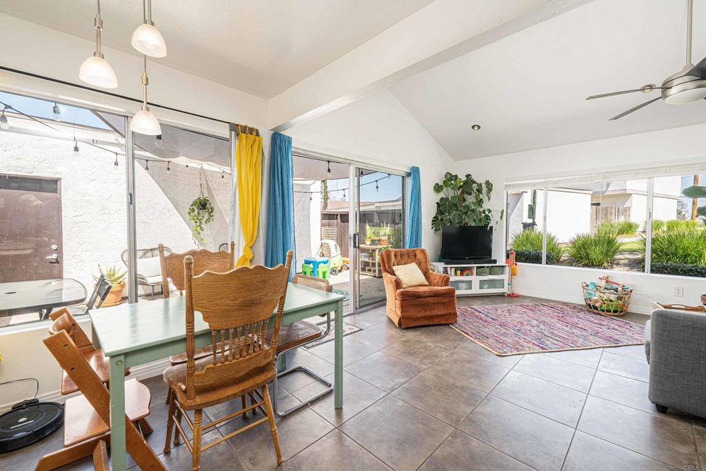 4159 Baycliff Way Oceanside, CA 92056 - Photo 9 of 23 a living room with furniture and a large window