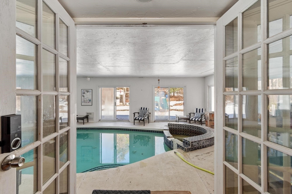 92 Prospect Street Lunenburg, MA 01462 - Photo 36 of 42 a kitchen with counter top space and windows