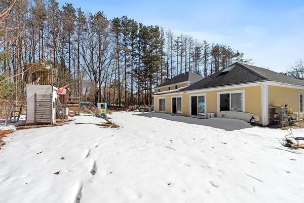 a view of a covered with snow on the road