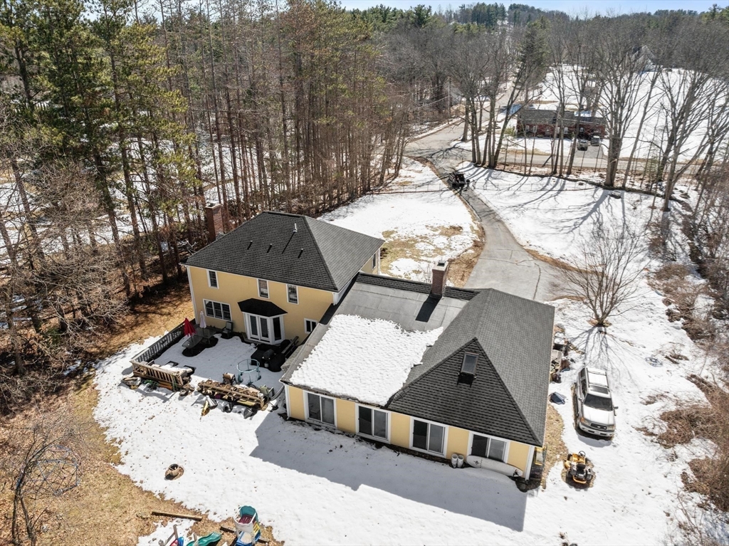 92 Prospect Street Lunenburg, MA 01462 - Photo 40 of 42 an aerial view of a house with yard and mountain view