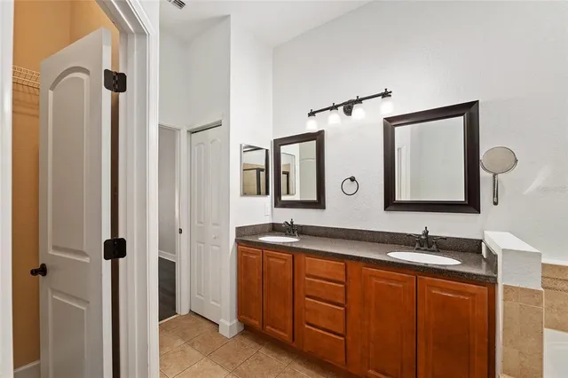 a bathroom with a bathtub a toilet and a shower