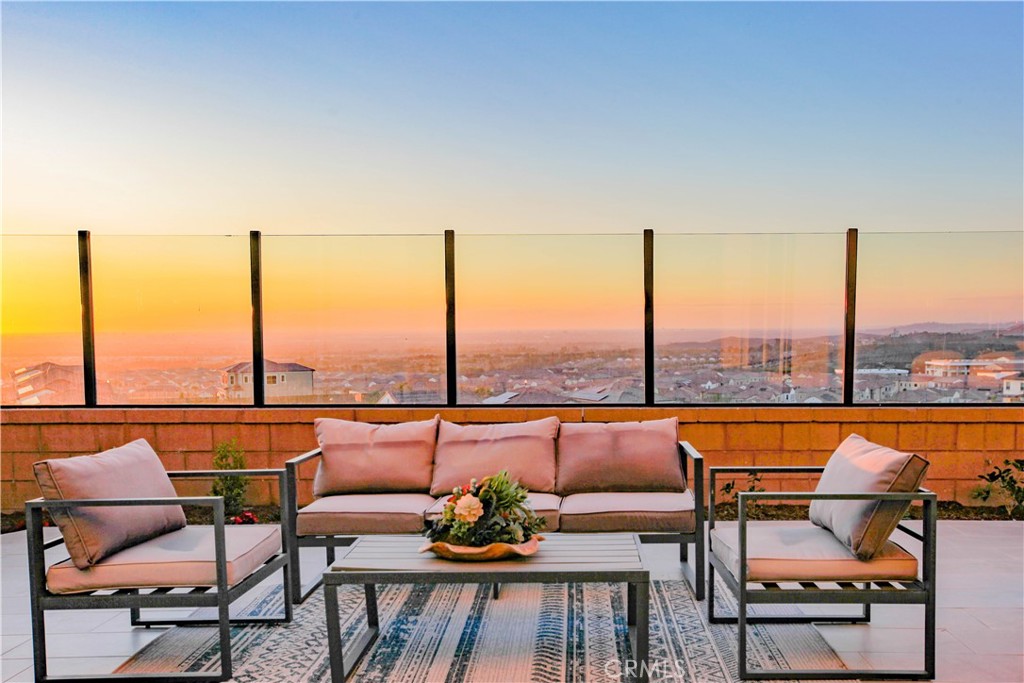 a view of a terrace with furniture