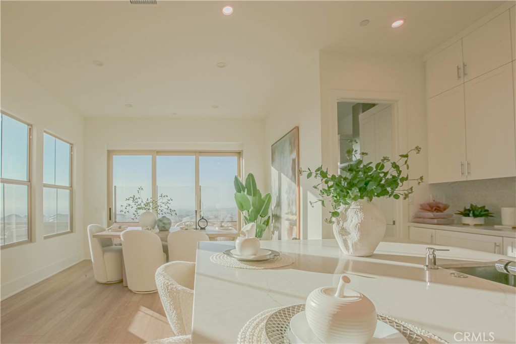 137 Oakstone Irvine, CA 92618 - Photo 11 of 23 a living room with furniture and a large window