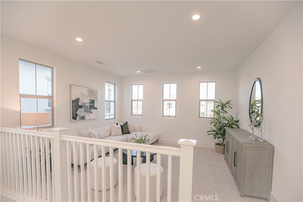137 Oakstone Irvine, CA 92618 - Photo 19 of 23 a bedroom with furniture and a window