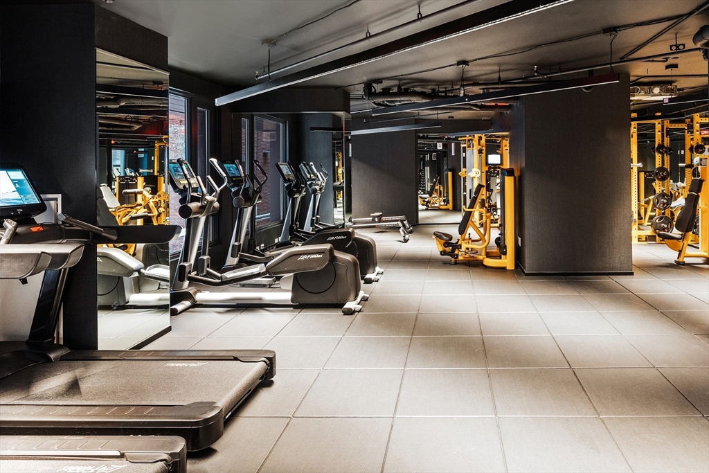55 Lagrange Street, Unit 1607 Boston, MA 02111 - Photo 13 of 16 a view of a room with gym equipment