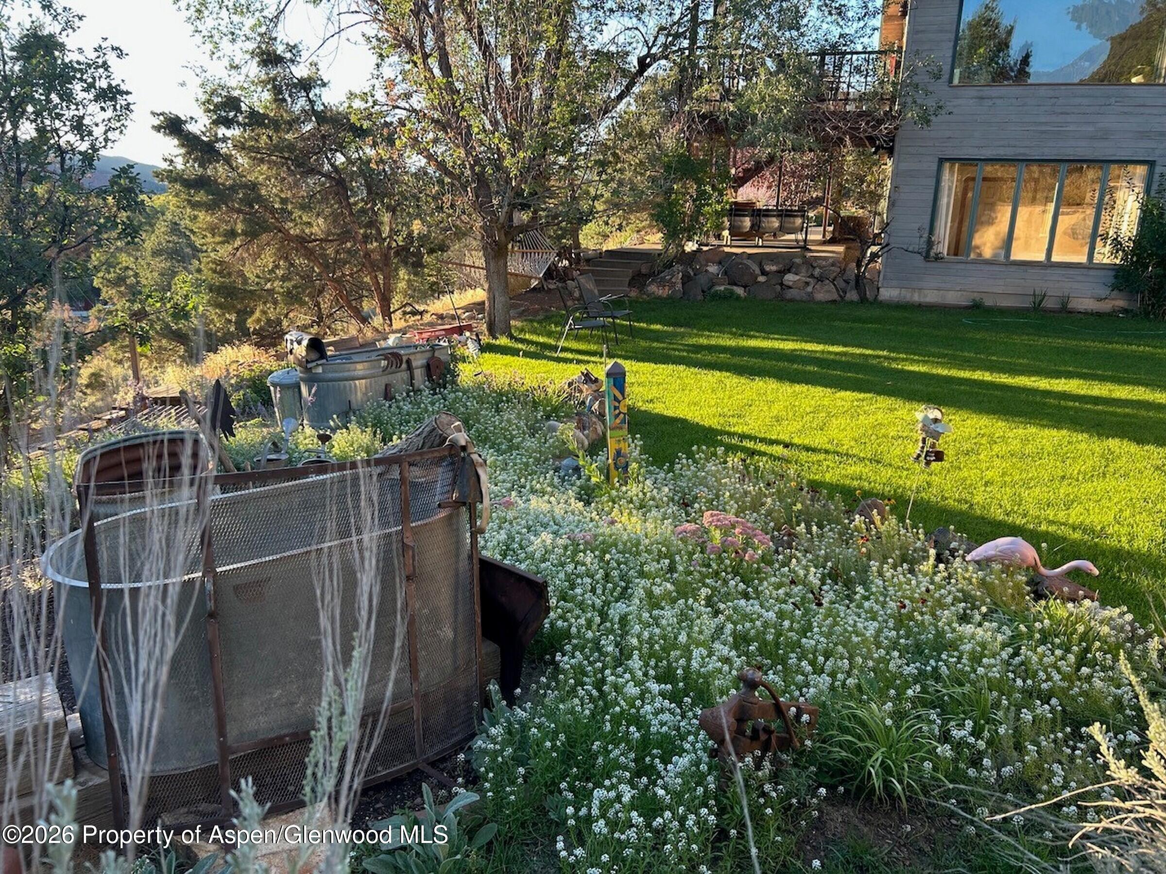 422 Sopris Creek Road Basalt, CO 81621 - Photo 59 of 74 Garden Lawn and Deck
