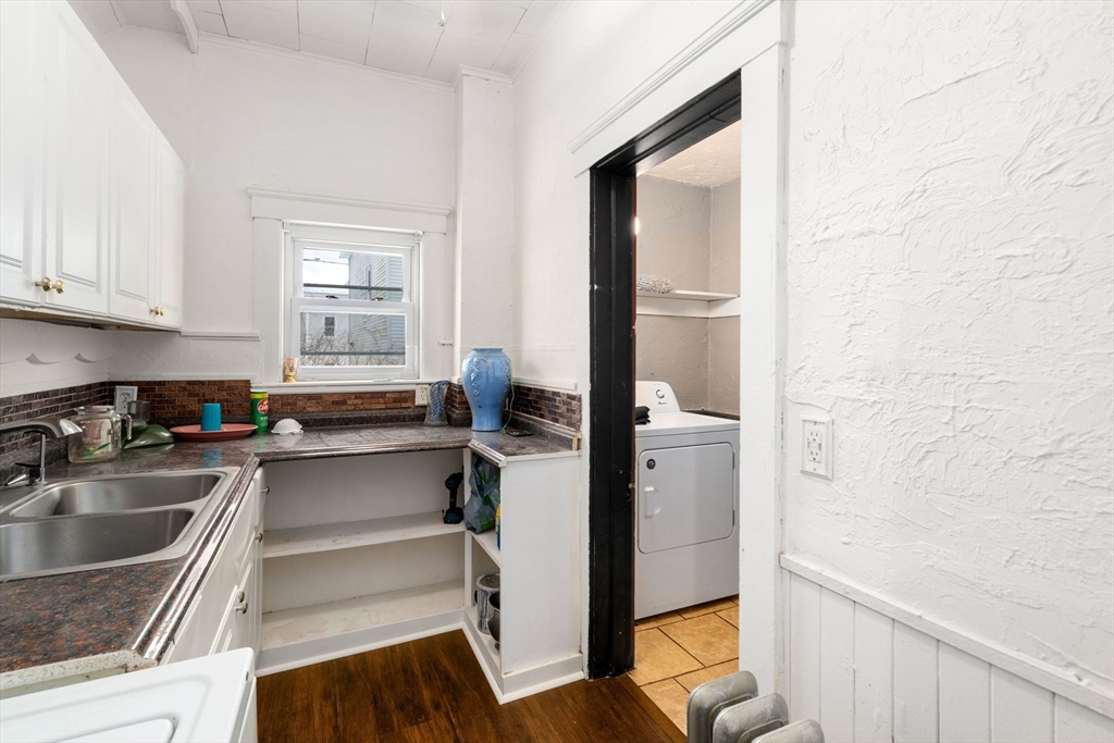 3 Park Street Webster, MA 01570 - Photo 14 of 19 a kitchen with a refrigerator sink and cabinets