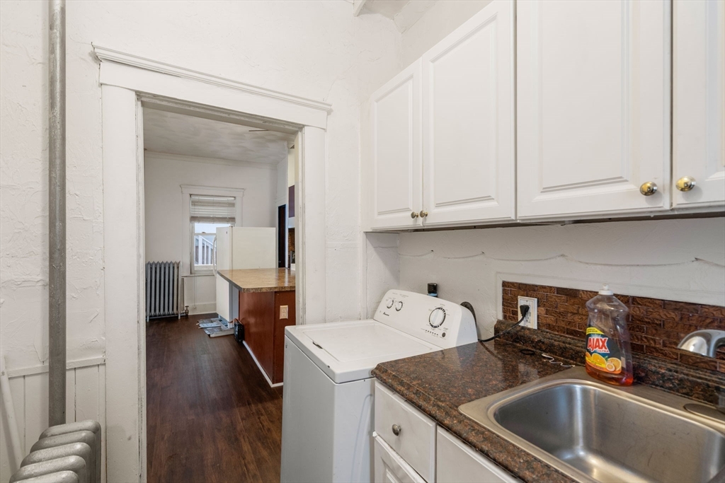 3 Park Street Webster, MA 01570 - Photo 15 of 19 a utility room with sink dryer and washer