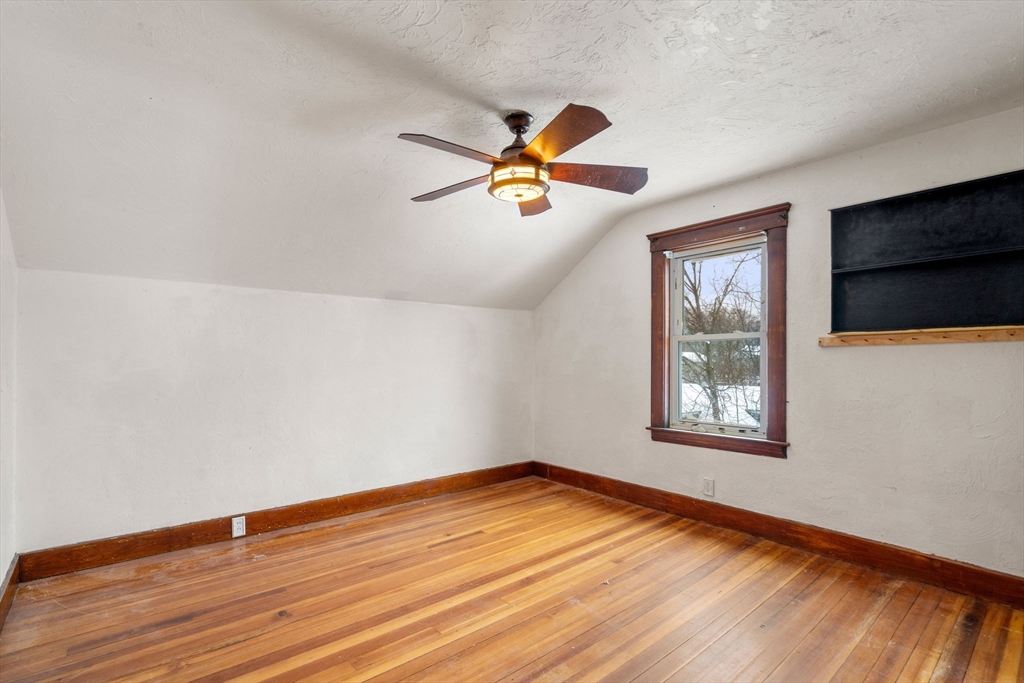 3 Park Street Webster, MA 01570 - Photo 3 of 19 a view of empty room with wooden floor and fan