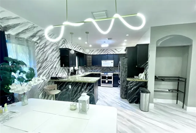 a view of a entryway with washer and dryer