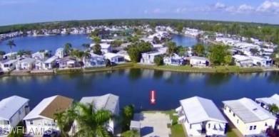 447 Cheetah Drive Naples, FL 34114 - Photo 1 of 42 an aerial view of residential houses with outdoor space